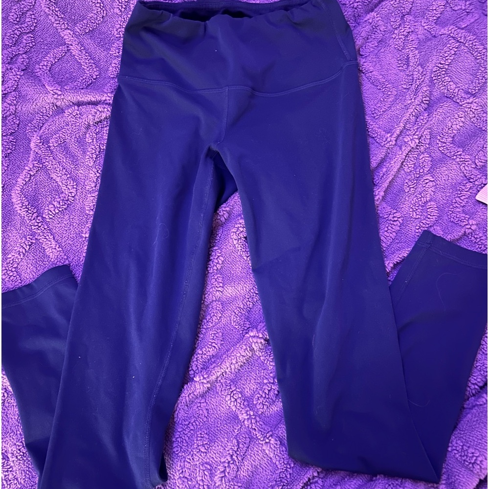 Women's small green/teal leggings.